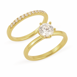 Dúo de anillos de boda en oro 14k amarillo con zirconias diseño moderno – Sol de Oro Joyería