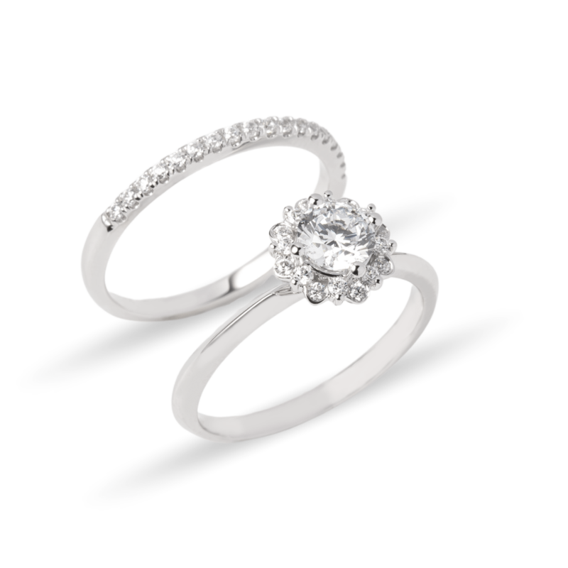 Dúo de anillos de boda en oro blanco 14k con zirconias y diseño halo floral – Sol de Oro Joyería
