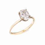 Anillo solitario under halo ovalado en oro blanco o amarillo 14K con zirconia central brillante