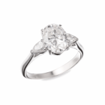 Anillo de compromiso tres piedras en oro blanco o amarillo 14K con zirconia central corte ovalado