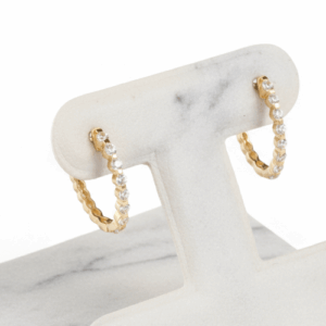 Aretes argollas ovaladas en oro 14K con zirconias